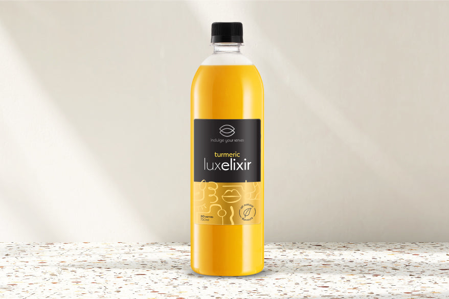 Enjoy a warming and delicious golden latte at home with Luxelixir turmeric syrup.